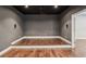 Spacious home theater features tiered seating and speaker pre-wiring at 19711 Wellington Manor Blvd, Lutz, FL 33549
