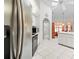 Bright kitchen with a view into the breakfast nook and adjacent rooms at 206 Forest Wood Ct, Spring Hill, FL 34609