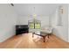 Elegant living room featuring hardwood floors, a piano, and a comfortable seating area at 206 Forest Wood Ct, Spring Hill, FL 34609