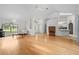Spacious living area with hardwood floors and an open concept layout at 206 Forest Wood Ct, Spring Hill, FL 34609