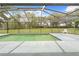 Inviting screened-in pool area with ample space for outdoor enjoyment and relaxing backyard views at 206 Forest Wood Ct, Spring Hill, FL 34609