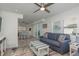 Inviting living room and dining area featuring modern furniture and plenty of natural light at 2271 Carolyn Dr, Dunedin, FL 34698