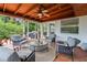 Screened lanai featuring a wood ceiling and views of the private backyard and mature landscaping at 2334 Tropical Shores Se Dr, St Petersburg, FL 33705