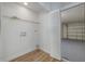 Spacious closet featuring shelving with access to the garage at 2436 Beacon Groves Blvd, Palm Harbor, FL 34683