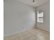 Bright bedroom with tile flooring and a large window, offering a serene and airy feel at 2803 Abbey Grove Dr, Valrico, FL 33594