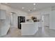 Open kitchen featuring stainless steel appliances, modern cabinetry and spacious countertops at 2803 Abbey Grove Dr, Valrico, FL 33594