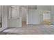 Bright living room featuring tiled floors, archways to adjacent rooms, and lots of natural light at 2803 Abbey Grove Dr, Valrico, FL 33594