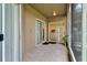 A sunroom with sliding glass doors showcasing the interior and exterior at 2803 Abbey Grove Dr, Valrico, FL 33594