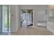 Enclosed patio with sliding glass doors, offering a seamless indoor-outdoor transition at 2803 Abbey Grove Dr, Valrico, FL 33594