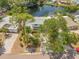 This property boasts a picturesque view of the home, neighborhood, water and lush greenery at 320 Tallahassee Ne Dr, St Petersburg, FL 33702