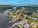 Waterfront property with stunning aerial views of the channel, surrounding neighborhood, and lush greenery at 320 Tallahassee Ne Dr, St Petersburg, FL 33702