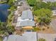 Aerial view of home with patio and dock on the water at 320 Tallahassee Ne Dr, St Petersburg, FL 33702