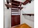 Walk in closet with custom built-in shelves and drawers at 320 Tallahassee Ne Dr, St Petersburg, FL 33702