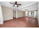 Inviting living room features patterned tile floors and ample natural light at 320 Tallahassee Ne Dr, St Petersburg, FL 33702