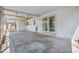 The spacious screened-in porch leads to the home's interior through glass doors at 320 Tallahassee Ne Dr, St Petersburg, FL 33702
