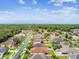 A neighborhood featuring beautiful homes, well-manicured lawns and mature trees in a desirable community at 3302 Granite Ridge Loop, Land O Lakes, FL 34638