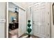 Inviting entryway with views to the office and neutral walls and tile at 3302 Granite Ridge Loop, Land O Lakes, FL 34638