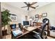 Spacious office with desk, ergonomic chair, and built in storage, providing a comfortable workspace at 3302 Granite Ridge Loop, Land O Lakes, FL 34638