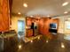 Spacious kitchen with stainless appliances, dark countertops, and plenty of cabinet space at 3419 Pearson Rd, Valrico, FL 33596