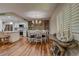 Well-lit dining area featuring modern shelving and open floor plan, conveniently adjacent to kitchen at 36750 Us 19 N # 24-213, Palm Harbor, FL 34684