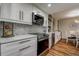 Stylish kitchen featuring stainless steel appliances and white countertops at 36750 Us 19 N # 24-213, Palm Harbor, FL 34684