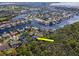 A waterfront community, with a beautiful home surrounded by lush greenery and a stunning water view at 4202 Deepwater Ln, Tampa, FL 33615