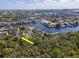 Secluded home offers privacy, and features a boat dock and a pool to enjoy the waterfront lifestyle at 4202 Deepwater Ln, Tampa, FL 33615