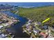 Property that features a waterfront location and community with an area that offers a serene backdrop for modern living at 4202 Deepwater Ln, Tampa, FL 33615