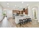 Beautiful kitchen with granite countertops, stainless steel appliances, and a breakfast bar at 4608 Scott Rd, Lutz, FL 33558