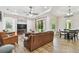 Open-concept living room featuring modern decor, recessed lighting, and tile flooring at 4608 Scott Rd, Lutz, FL 33558
