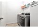 Laundry room with modern washer and dryer at 5446 Suncatcher Dr, Wesley Chapel, FL 33545