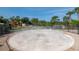 Community splash pad with water features, surrounded by a safe, paved area, and playground at 5446 Suncatcher Dr, Wesley Chapel, FL 33545