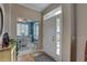Beautiful entryway with an open view into the dining area at 580 Shoreham Ne Ct, St Petersburg, FL 33716