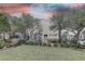 Charming two-story home with mature landscaping and a welcoming entrance at 580 Shoreham Ne Ct, St Petersburg, FL 33716
