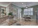Bright kitchen with granite countertops and a dining area with lots of light at 580 Shoreham Ne Ct, St Petersburg, FL 33716