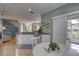 Open concept kitchen with granite countertops, lots of natural light and stainless steel appliances at 580 Shoreham Ne Ct, St Petersburg, FL 33716