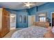 Bright main bedroom features an ensuite bathroom, walk-in closet, and ample natural light at 580 Shoreham Ne Ct, St Petersburg, FL 33716