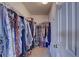 Well-organized walk-in closet with ample shelving and hanging space to maximize storage at 580 Shoreham Ne Ct, St Petersburg, FL 33716