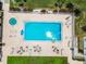 An aerial view of the community pool, hot tub, and surrounding area at 5817 Park N St # 310, St Petersburg, FL 33709