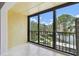 Balcony featuring tile flooring and views of the lake at 5817 Park N St # 310, St Petersburg, FL 33709