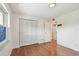 Bedroom with hardwood floors, closet, and window with lots of natural light at 5817 Park N St # 310, St Petersburg, FL 33709
