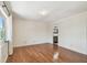 Bright bedroom featuring wood flooring, white walls, and natural light at 5817 Park N St # 310, St Petersburg, FL 33709
