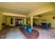 Inviting common area with seating, planters and a red brick walkway at 5817 Park N St # 310, St Petersburg, FL 33709