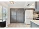 Bright, updated kitchen featuring modern appliances and light wood grain floors at 5817 Park N St # 310, St Petersburg, FL 33709