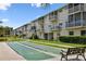 Enjoy outdoor games on these community shuffleboard courts located adjacent to the condo building at 5817 Park N St # 310, St Petersburg, FL 33709
