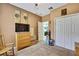 Bedroom featuring carpet floors, dresser, and a double door closet at 5925 Sweet William Ter, Land O Lakes, FL 34639