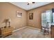 Bedroom featuring carpet floors, ceiling fan, and natural wood furniture at 5925 Sweet William Ter, Land O Lakes, FL 34639