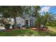 Charming home featuring a two-car garage and a landscaped front yard at 5925 Sweet William Ter, Land O Lakes, FL 34639