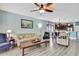 Spacious living area with an open layout that flows into the dining room and kitchen, great for entertaining at 5925 Sweet William Ter, Land O Lakes, FL 34639
