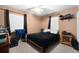 Bedroom with small bed and lots of music equipment at 5960 Boyette Rd, Wesley Chapel, FL 33545